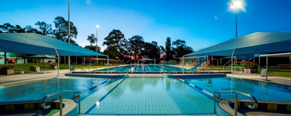 image of a public swimming pool at twilight