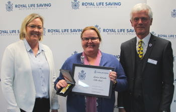 Catherine Cruttenden receiving her award from Beyond Bank's Georgie Nicholas and RLSSWA President Colin Hassell