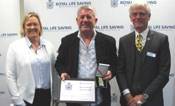 Jamie Back receiving his award from Beyond Bank's Georgie Nicholas and RLSSWA President Colin Hassell
