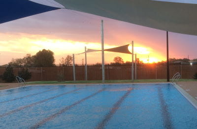 An image of the Balgo pool at sunset