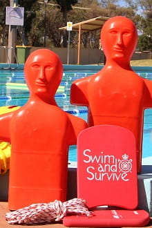 lifesaving manikins, throw rope and kick boards