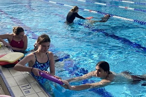 Churchlands students practising teaching swimming