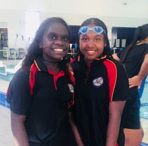 Two girls from Clontarf Aboriginal College doing swimming lessons