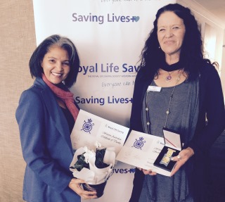 Sharlyn Rahman and Eleanor Lee proudly displaying their awards