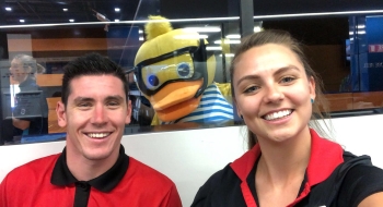 Dippy photo bombs a pair of local Port Hedland community members