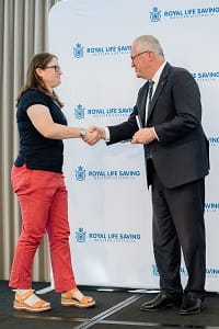 Janelle receiving her award