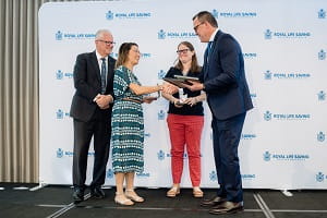 Aimee receiving her award