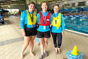 swimming instructors standing in front of Kalgoorlie pool
