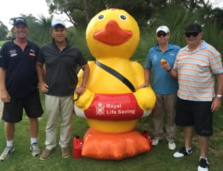 Our team at the SPASA WA golf day with Quackers the inflatable duck