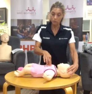 Royal Life Saving's Jacqui Forbes demonstrating infant CPR on a baby manikin