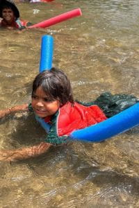 Warmun kids by a river