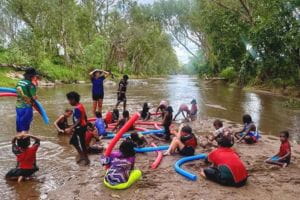 Warmun kids by a river