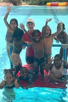 Deb Gill with kids at the Jigalong Pool