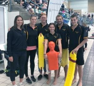 Members of the WA pool lifesaving team by the pool at the JLC State Titles