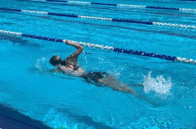 A girl swimming in a pool
