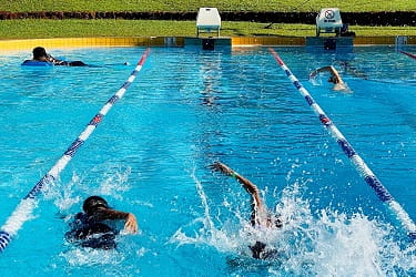 people swimming laps at Kununurra Leisure Centre's outdoor pool