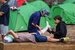 camp students practising first aid techniques