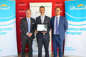 City of Swan Mayor Kevin Bailey, Minister for Sport and Recreation Dr Tony Buti and Royal Life Saving WA CEO Peter Leaversuch with a Lotterywest cheque