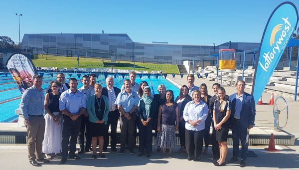Royal Life Saving staff and stakeholders with Sport and Recreation Minister Mick Murray and representatives from Lotterywest and the Department of Local Government, Sport and Cultural industries by the pool at HBF Stadium 