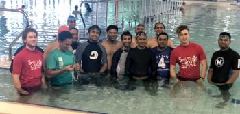 Multicultural men with their instructor in the pool at Cannington Leisureplex