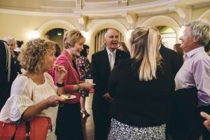 Jim Ellis and Molly Coldwell with Governor Kerry Sanderson AO and friends enjoying a chat at Government House after the Royal Life Saving Bravery Awards