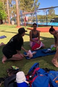 Newman teachers practising CPR skills