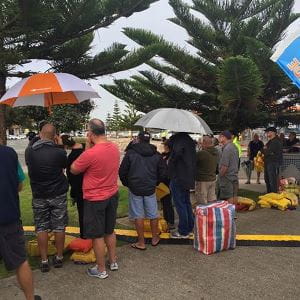 image of people queuing with their lifejackets to exchange
