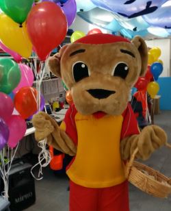 Walter the Watchdog with balloons and giveaways at the Swim School Open Days