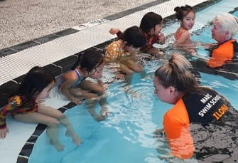 multicultural children participating in swimming lesson at Mandurah Aquatic and Recreation Centre