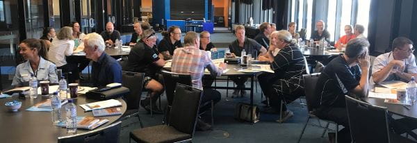 Attendees conducting group discussions at the Pilbara Forum