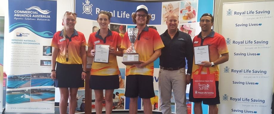 image of winning team from Mandurah Aquatic Centre with their trophy