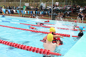 St John's Primary School students in a PFD swimming relay