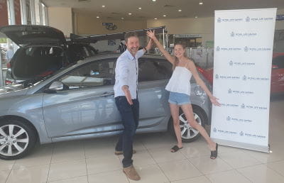 Raffle winner Dean English and daughter Carrie English with their brand new Hyundai