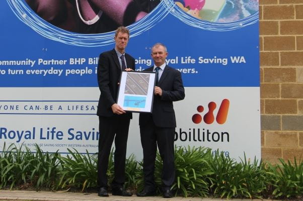RLSSWA's Greg Tate presenting Dr Kim Hames MLA with a plaque for his service to the Remote Aboriginal Swimming Pools Project