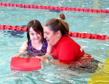 SAIL participant Sahara Pittaway during a swimming lesson with instructor Cecilia Cappeluti