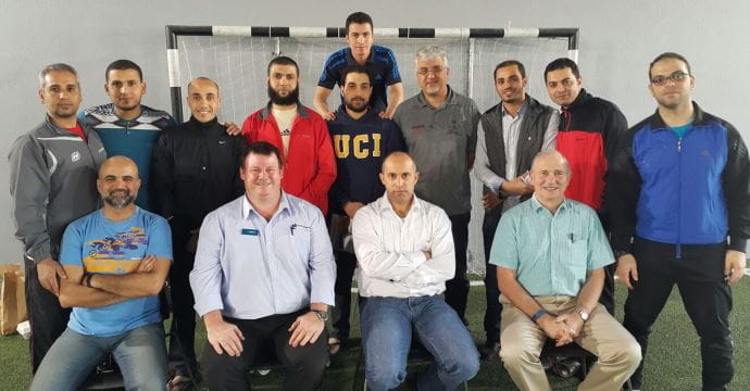 group of lifeguards gathered for photo after training course