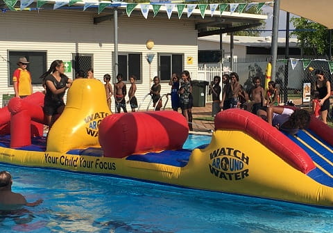 fitzroy crossing kids on giant pool inflatable