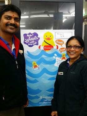 image of IGA Morley staff with Stick-a-duck pond poster