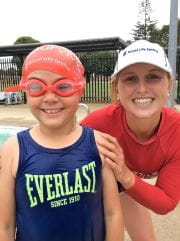 Swimming instructor and student