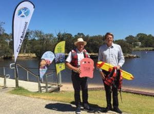 MP Steve Irons and RLSSWA's Trent Hotchkin with rescue equipment by the Swan River
