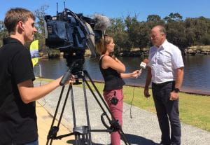 Federal MP Steve Irons being interviewed by a GWN reporter with a cameraman
