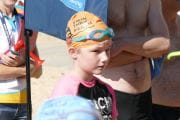little girl in swim thru swimming cap