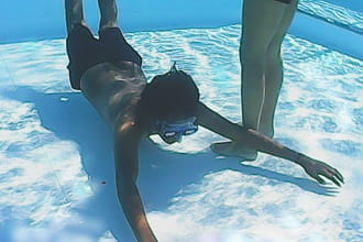 young male practising a search pattern technique wearing blackout goggles