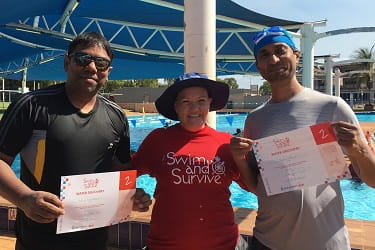 Lauren Thompson with multicultural swimming lesson participants