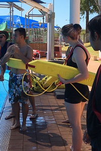 girl holding rescue tube