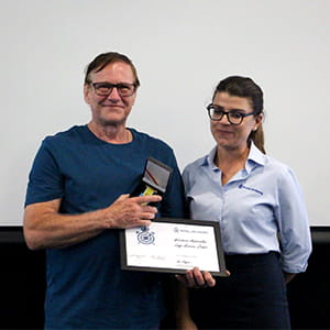 Ian Hayes receiving his award