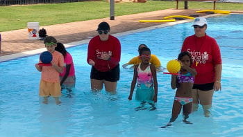 Kids taking part in a game as part of their swimming carnival