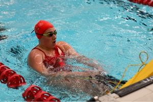 An athlete in the water at the State Pool Lifesaving Championships