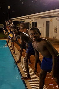 Kids ready to jump in the pool at the Warmun night disco 