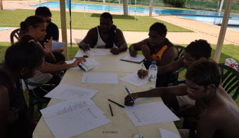 Warmun Aboriginal youth completing the theory section of their Bronze Medallion course